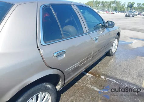 2003 Ford Crown Victoria Lx z USA, uszkodzony, nr VIN 2FAHP74W03X182686